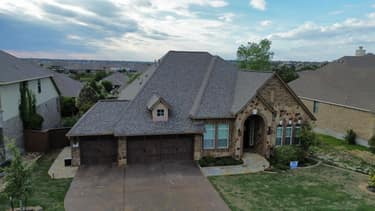 Aerial view of a residential roof replacement project